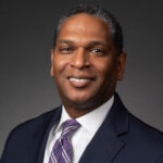 Travis E. Mitchell
